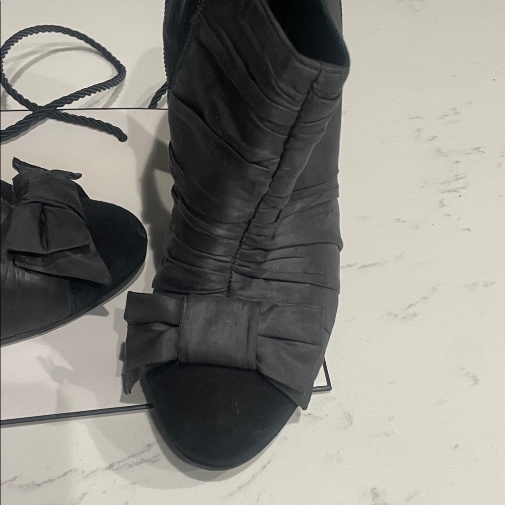 CHANEL Black Heeled Boots with Bow Accent - Picture 3 of 9